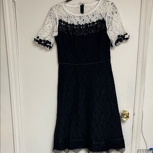 Once worn Elegant Black and White Lace Dress size 2